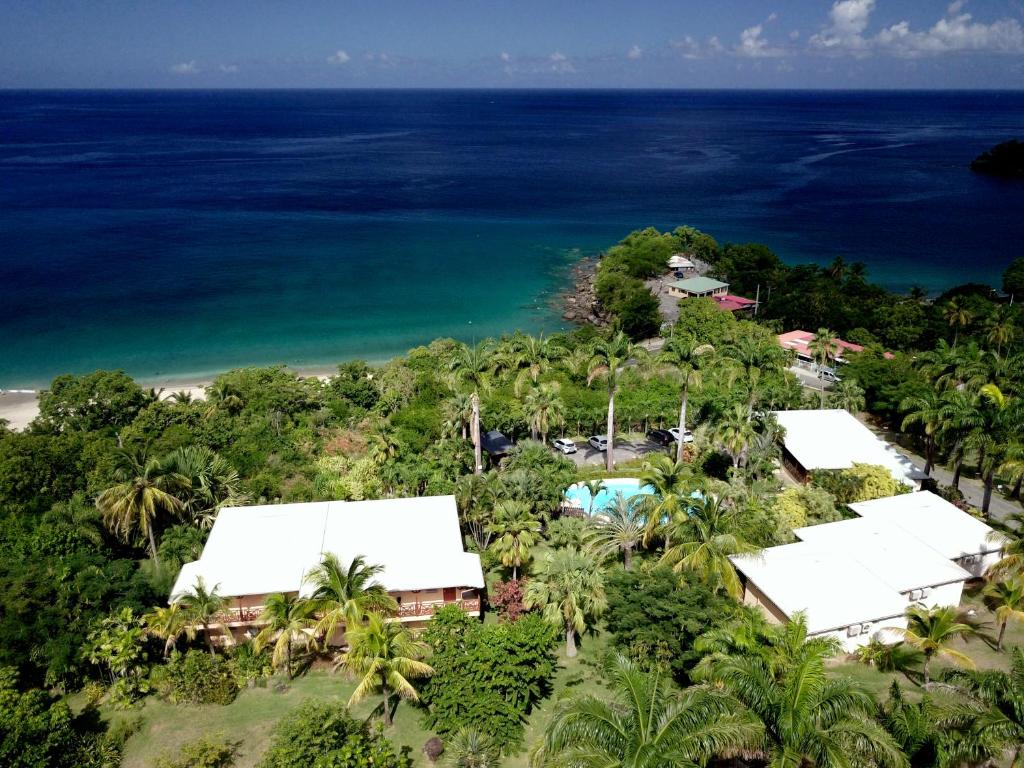 an aerial view of the resort and the ocean at Residence AU 'TI SUCRIER in Deshaies