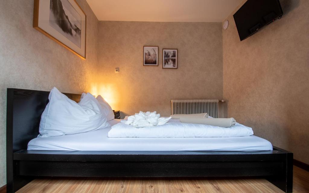 Postel nebo postele na pokoji v ubytování Bergzeit Appartments