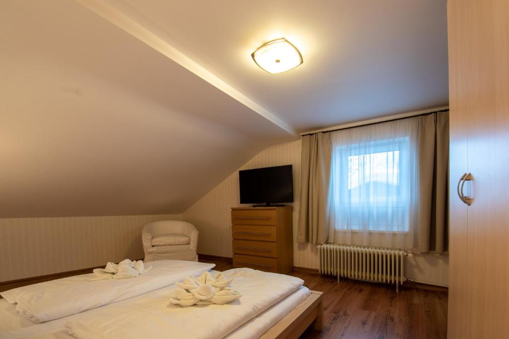 Postel nebo postele na pokoji v ubytování Bergzeit Appartments