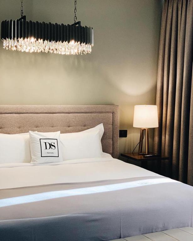Postel nebo postele na pokoji v ubytování DS Hotel Lusopark