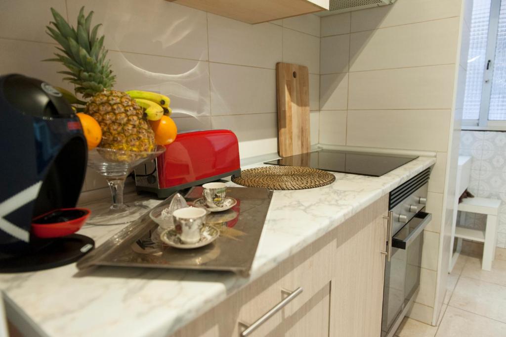 Kuchyň nebo kuchyňský kout v ubytování City apartment