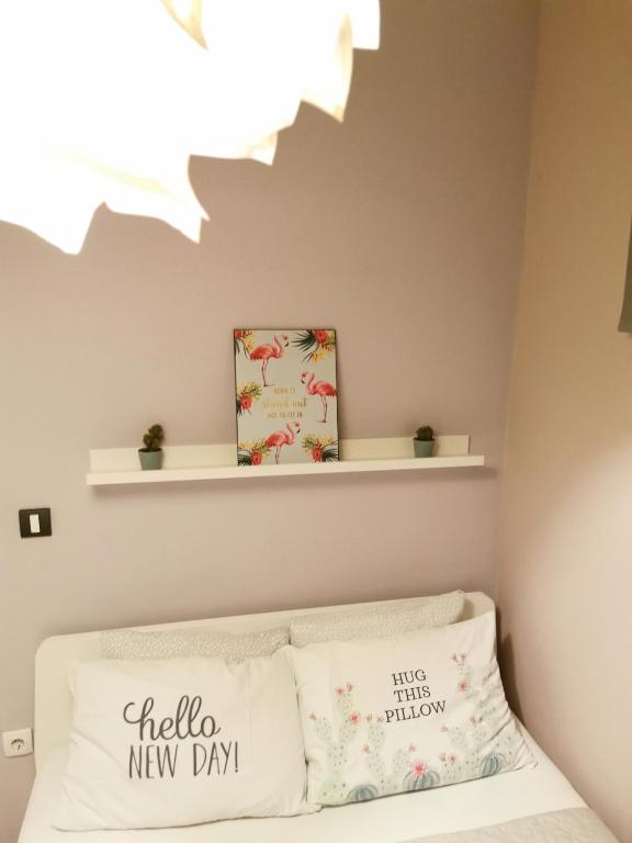 Postel nebo postele na pokoji v ubytování Nest