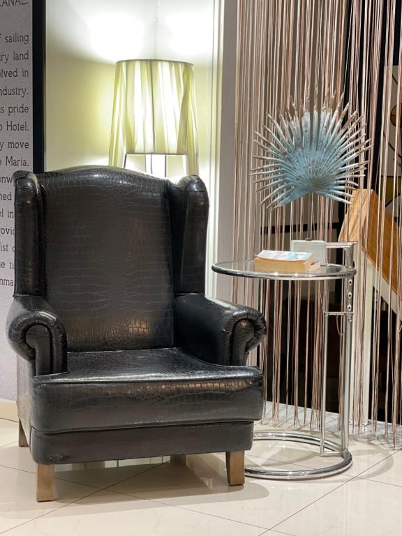 Posezení v ubytování Trokadero Boutique Hotel