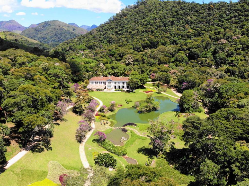 an aerial view of a house in the mountains at Casa Marambaia Hotel in Petrópolis