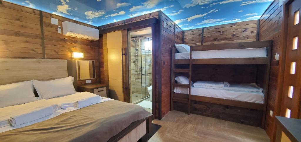 Postel nebo postele na pokoji v ubytování Cuki Residence