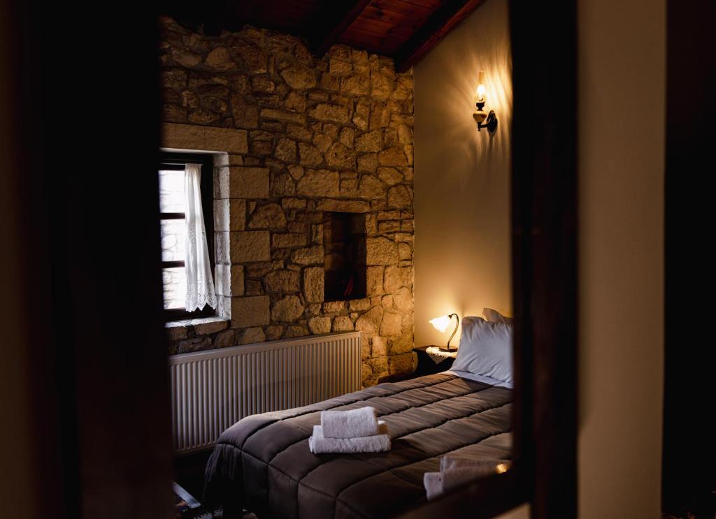 Postel nebo postele na pokoji v ubytování Guesthouse Armakas