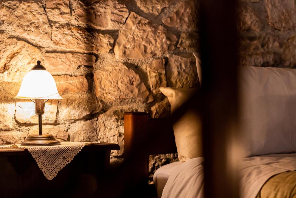 Postel nebo postele na pokoji v ubytování Guesthouse Armakas
