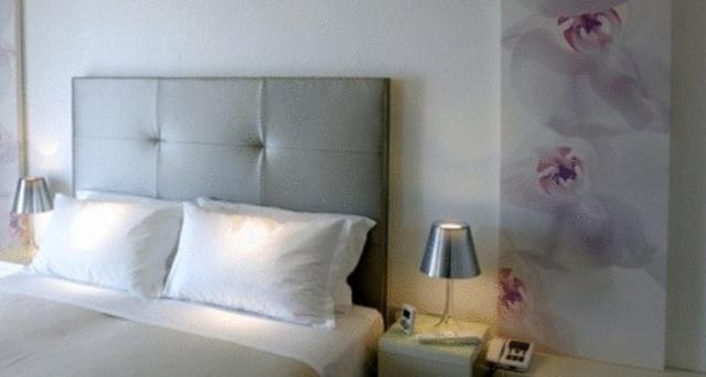 Postel nebo postele na pokoji v ubytování Hotel Torremaura