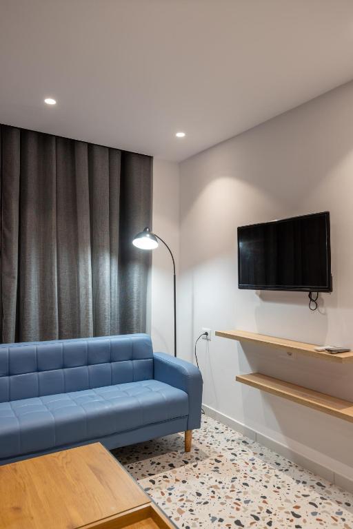 TV a/nebo společenská místnost v ubytování Spa & Pool - Studio Apartments 365