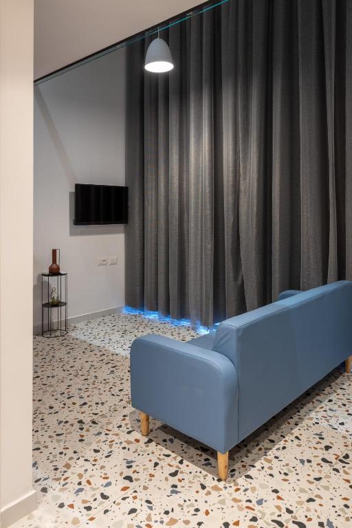 TV a/nebo společenská místnost v ubytování Spa & Pool - Studio Apartments 365