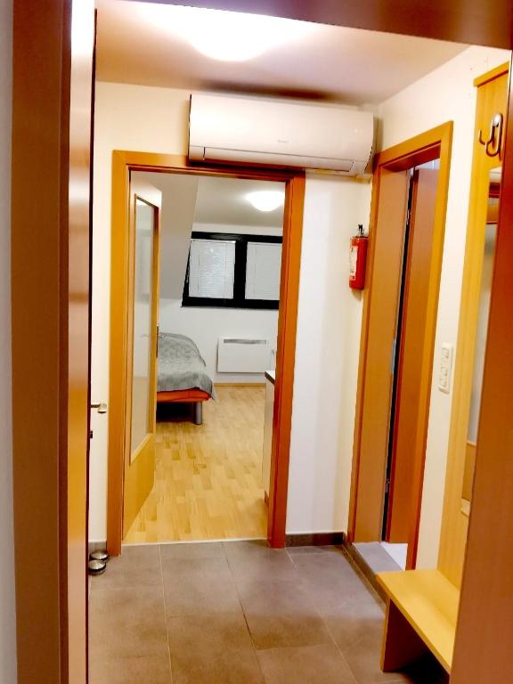 Postel nebo postele na pokoji v ubytování Apartma Happy