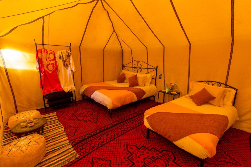 Postel nebo postele na pokoji v ubytování Luxury Bega Camp