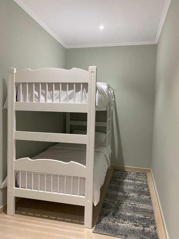 Postel nebo postele na pokoji v ubytování Cozy GuestHome Korce