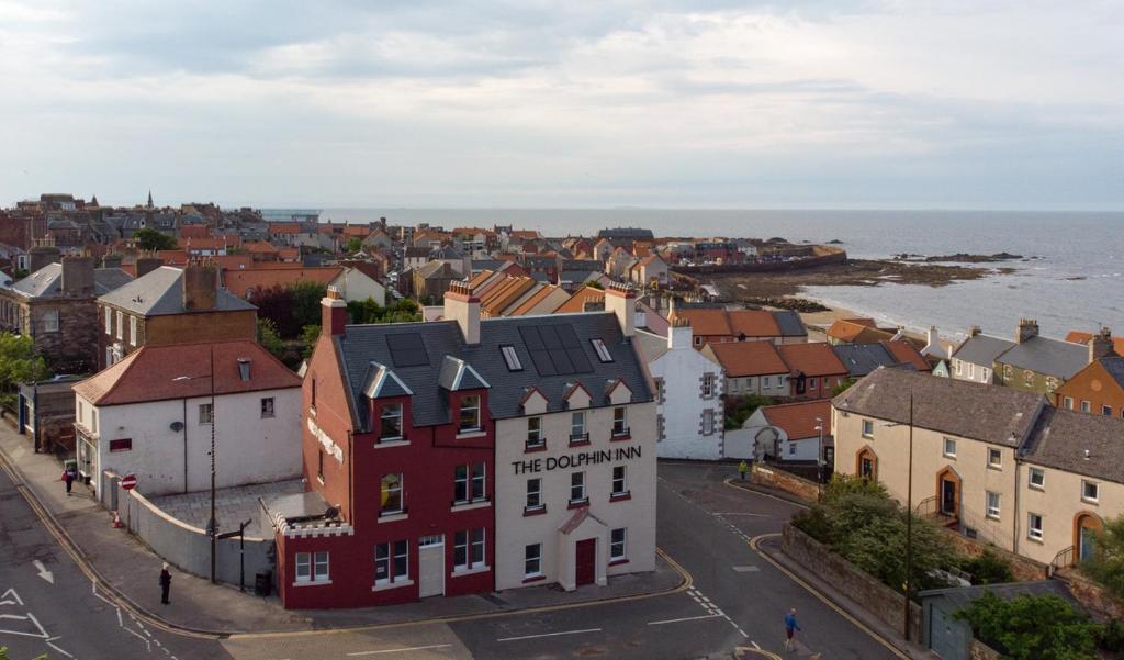 an aerial view of a town next to the ocean at The Dolphin Inn Hostel in Dunbar