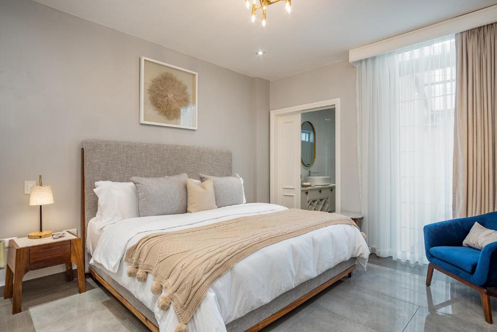 Postel nebo postele na pokoji v ubytování Hotel Casa Arum