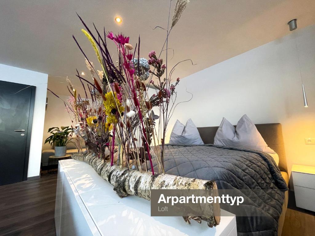 Postel nebo postele na pokoji v ubytování Apartment Spitzenblick