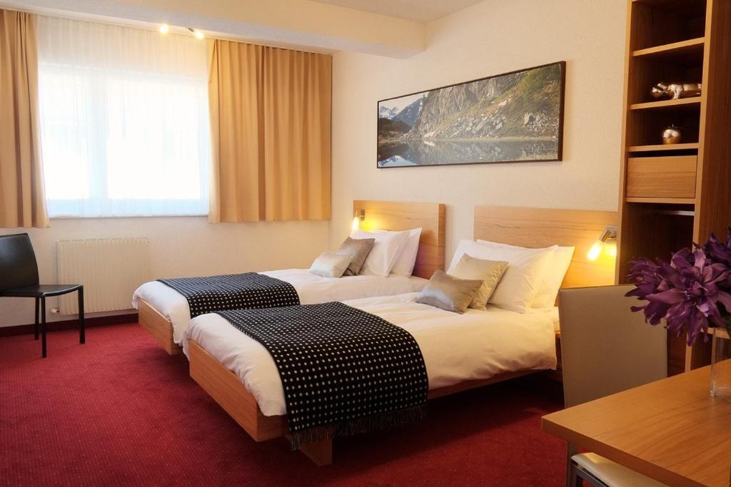 Postel nebo postele na pokoji v ubytování Chalet Gamskar