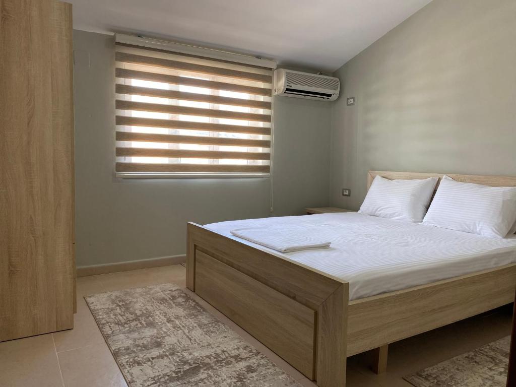 Posteľ alebo postele v izbe v ubytovaní Cozy GuestHome Korce