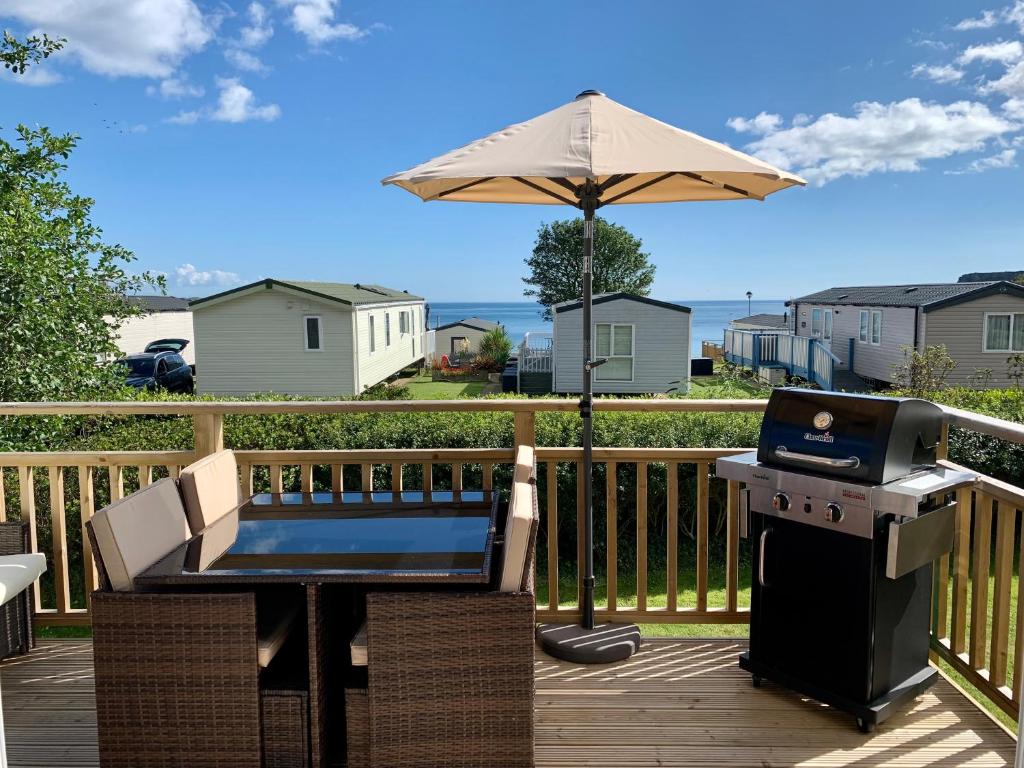 Μπαλκόνι ή βεράντα στο Lydstep Beach BayView 3-Bedroom Holiday Home