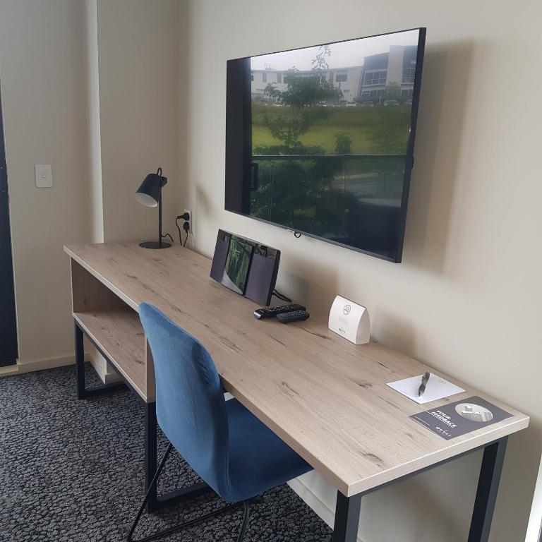Quest Queenstown Apartments Remarkables Parkにあるテレビまたはエンターテインメントセンター