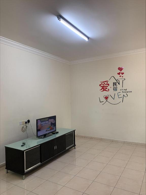 TV a/nebo společenská místnost v ubytování 爱民宿 Love House
