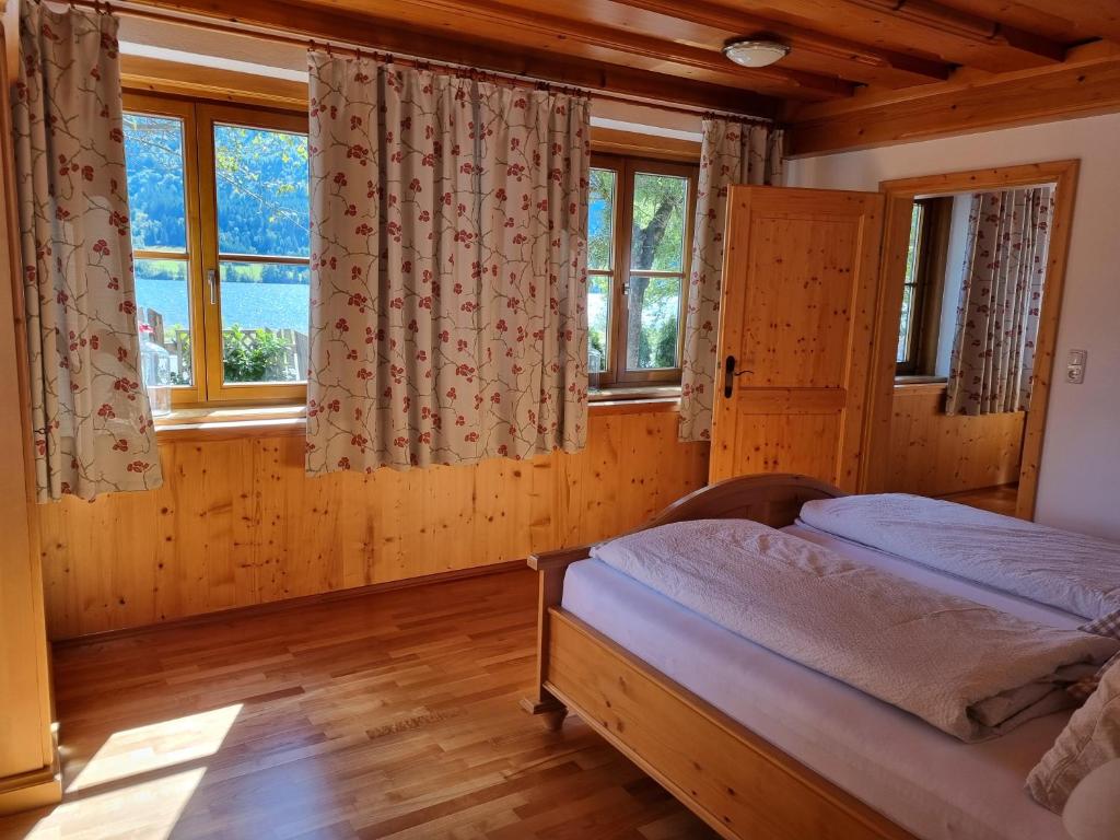 Posteľ alebo postele v izbe v ubytovaní Pension Ladner
