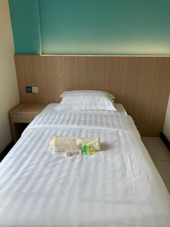 Postel nebo postele na pokoji v ubytování M Quality Hotel