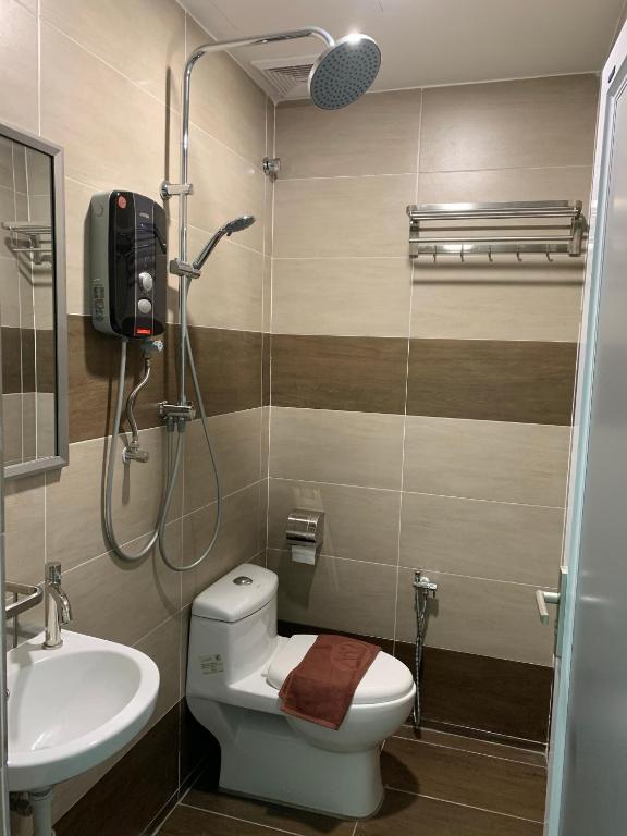 Koupelna v ubytování M Quality Hotel