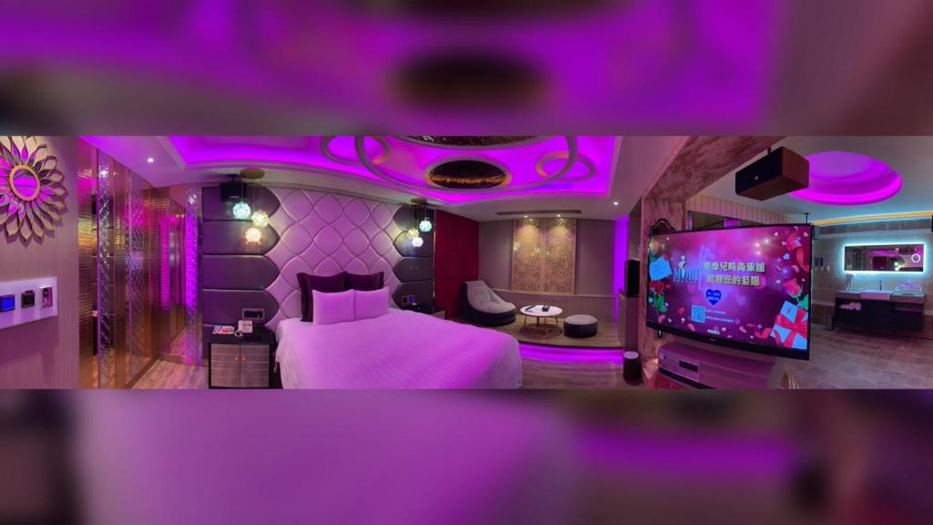 TV a/nebo společenská místnost v ubytování I-more Motel