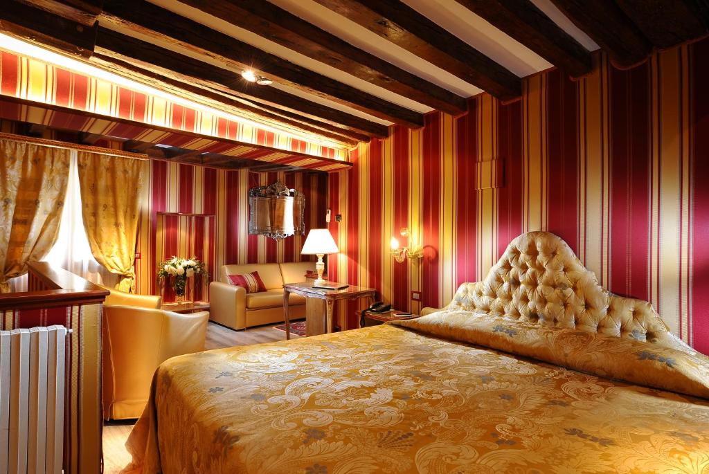 Cama ou camas em um quarto em Ca' Marinella