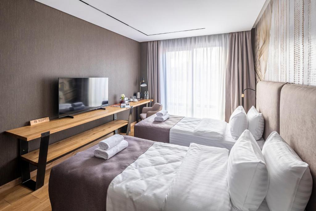 TV a/nebo společenská místnost v ubytování Loft7