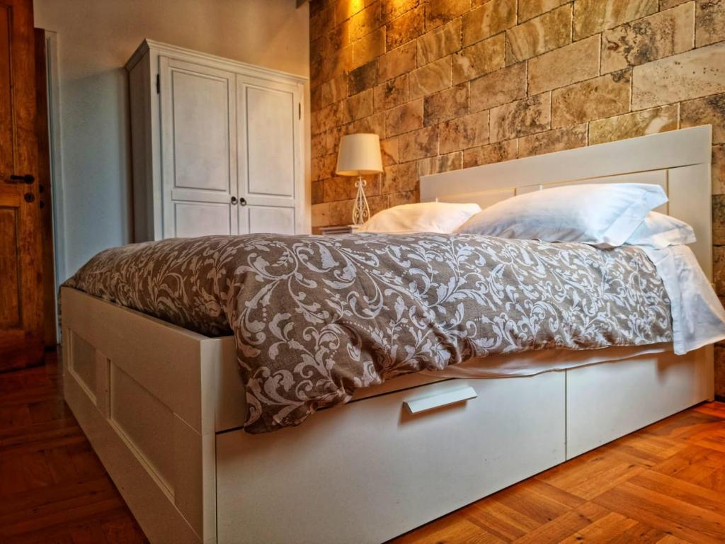 Postel nebo postele na pokoji v ubytování Appartamento San Frediano