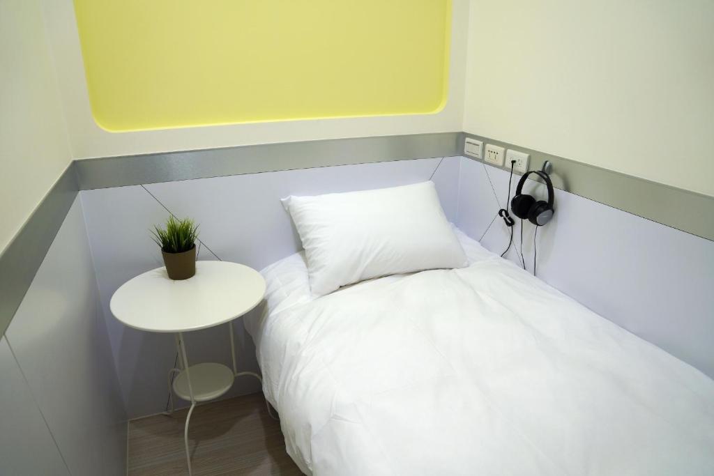 Postel nebo postele na pokoji v ubytování ColorMix Hotel & Hostel