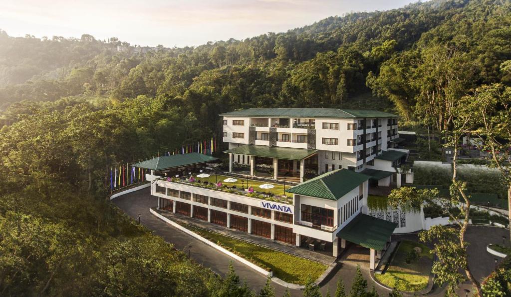 an aerial view of a hotel in the mountains at Vivanta Sikkim Pakyong in Gangtok