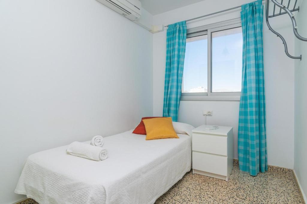 Postel nebo postele na pokoji v ubytování Ran de Mar