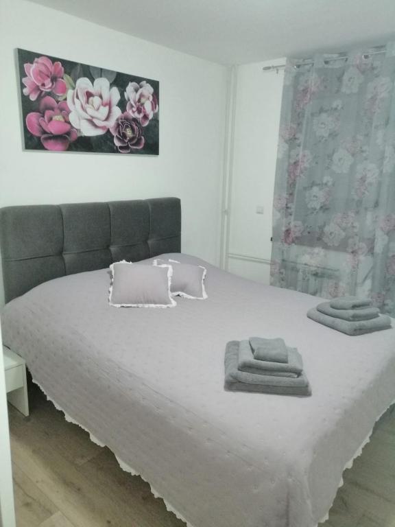 Postel nebo postele na pokoji v ubytování Apartman KATJA