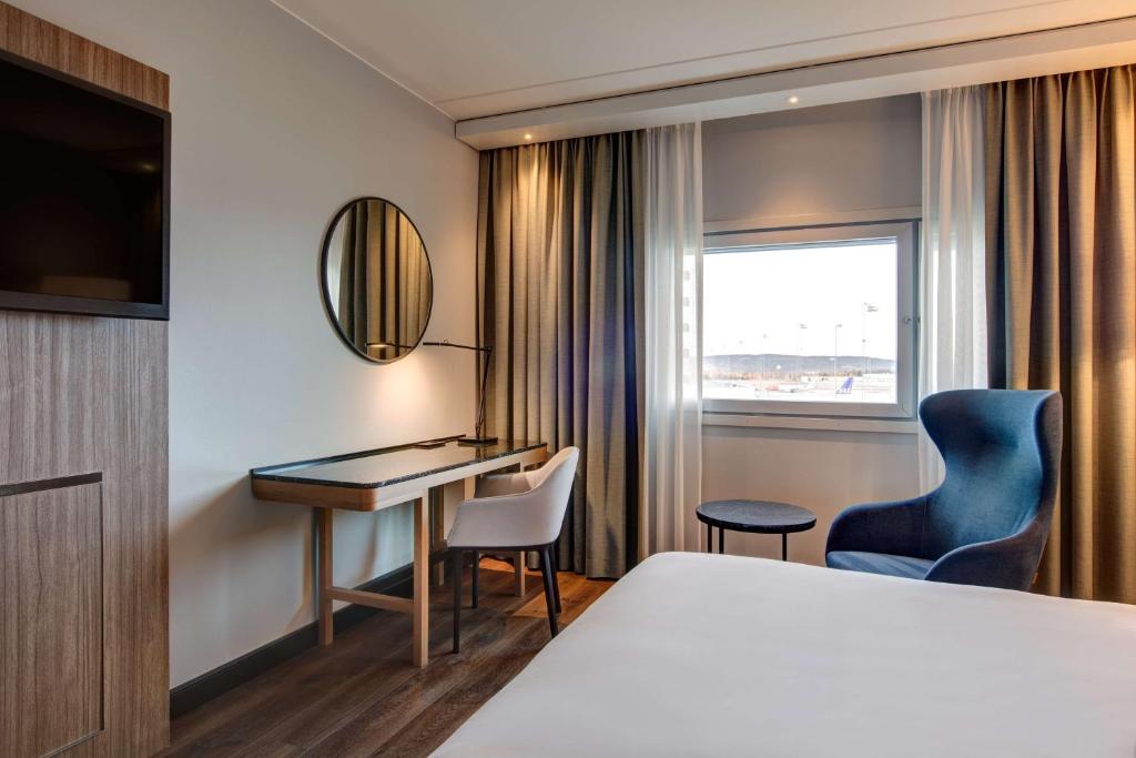 Postel nebo postele na pokoji v ubytování Radisson Blu Airport Hotel, Oslo Gardermoen