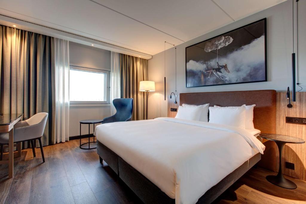 Postel nebo postele na pokoji v ubytování Radisson Blu Airport Hotel, Oslo Gardermoen
