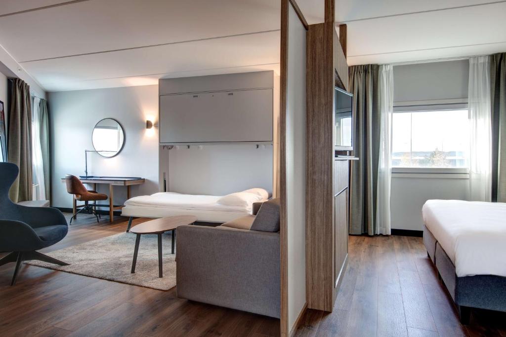 Postel nebo postele na pokoji v ubytování Radisson Blu Airport Hotel, Oslo Gardermoen