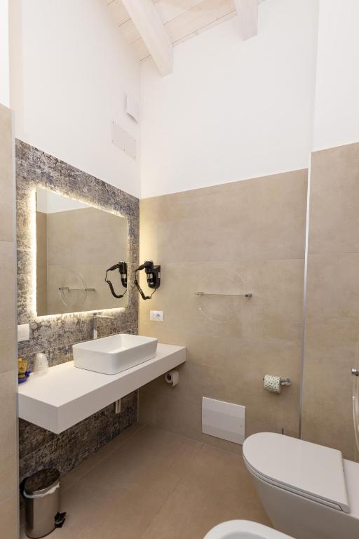 Koupelna v ubytování Hotel Caramare