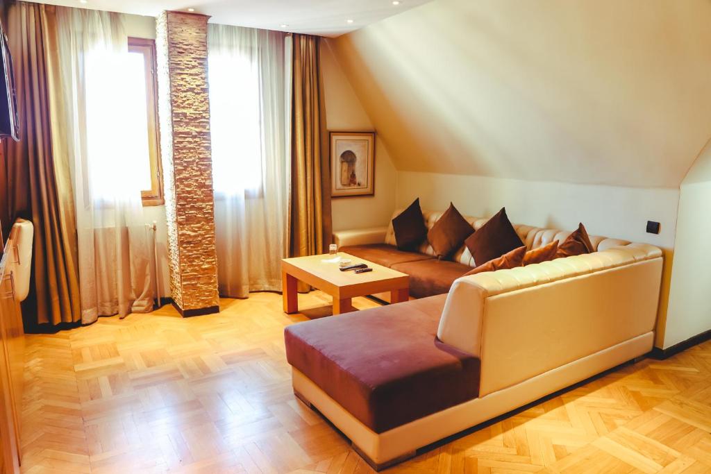 Posezení v ubytování Hotel Perce Neige