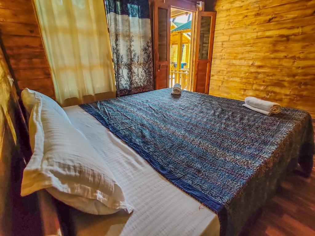 Letto o letti in una camera di Next ta Sea