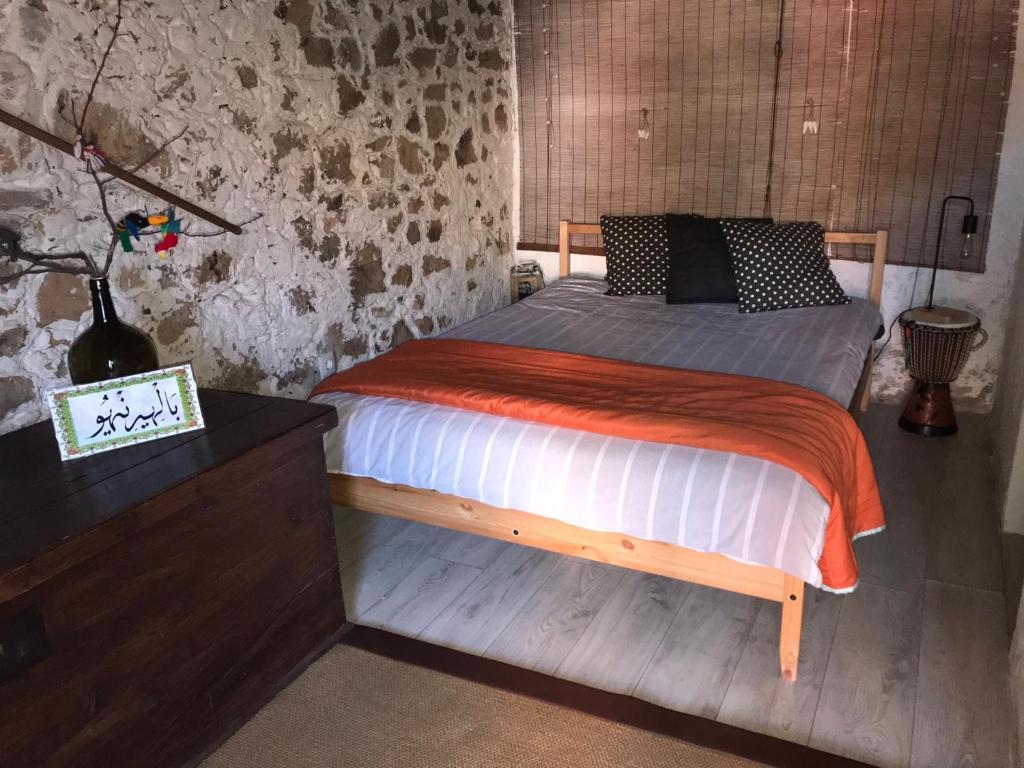 Tempat tidur dalam kamar di Palheirinho