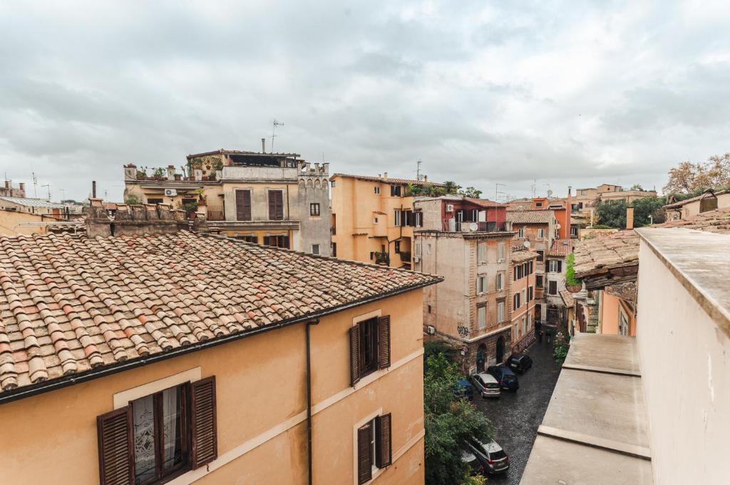 an aerial view of a city with buildings at Nikis Collection Trastevere in Rome