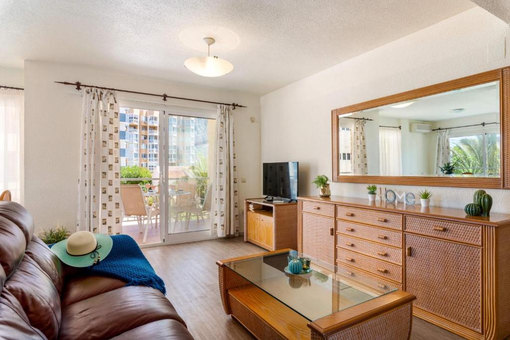 Televízia a/alebo spoločenská miestnosť v ubytovaní Apartamento Arenal 2 - PlusHolidays