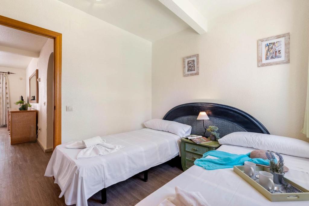 Posteľ alebo postele v izbe v ubytovaní Apartamento Arenal 2 - PlusHolidays