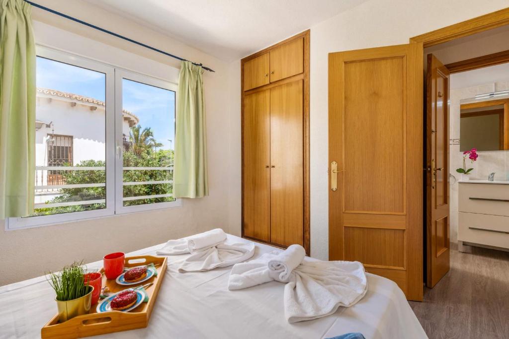 Posteľ alebo postele v izbe v ubytovaní Apartamento Arenal 2 - PlusHolidays