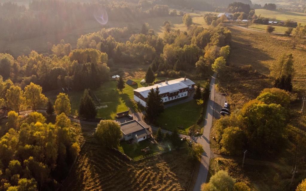 an aerial view of a house in a field at Penzion Dobík Pasečná in Přední Výtoň