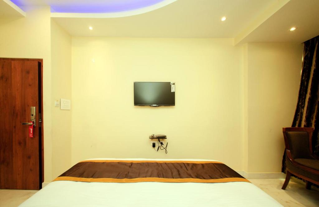 TV a/nebo společenská místnost v ubytování Hotel Golden Palace