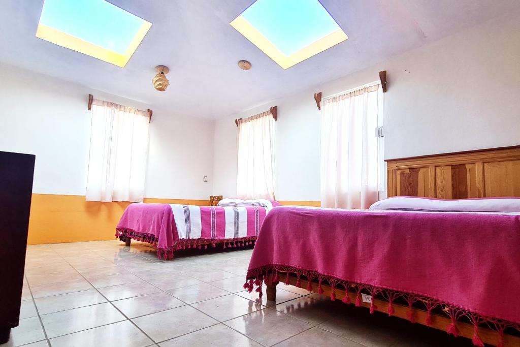 Postel nebo postele na pokoji v ubytování Senda Monarca